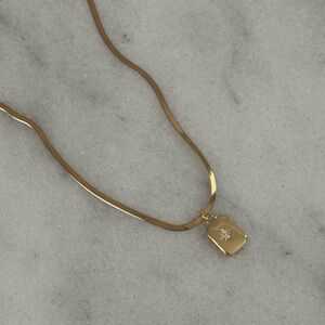 Gold Star Burst Crystal Pendant Necklace 

Brand New